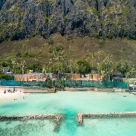 Magnates globalistas invierten millones de dólares en playas exclusivas que dicen que desaparecerán por el “calentamiento global”