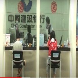 Estalla una nueva corrida bancaria en China: Los ahorristas retiran sus depósitos masivamente del Banco de Cangzhou tras la caída del gigante Evergrande